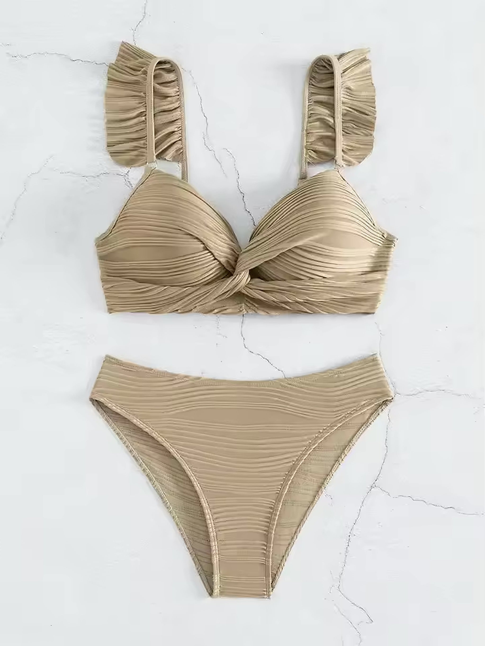 Beige ruched bikini set with twist-front bandeau top and textured high-waisted bottoms displayed on white background.