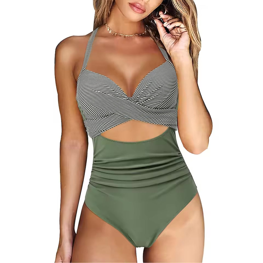 Woman wearing striped wrap bikini top with green ruched high-waist bikini bottom and gold necklace